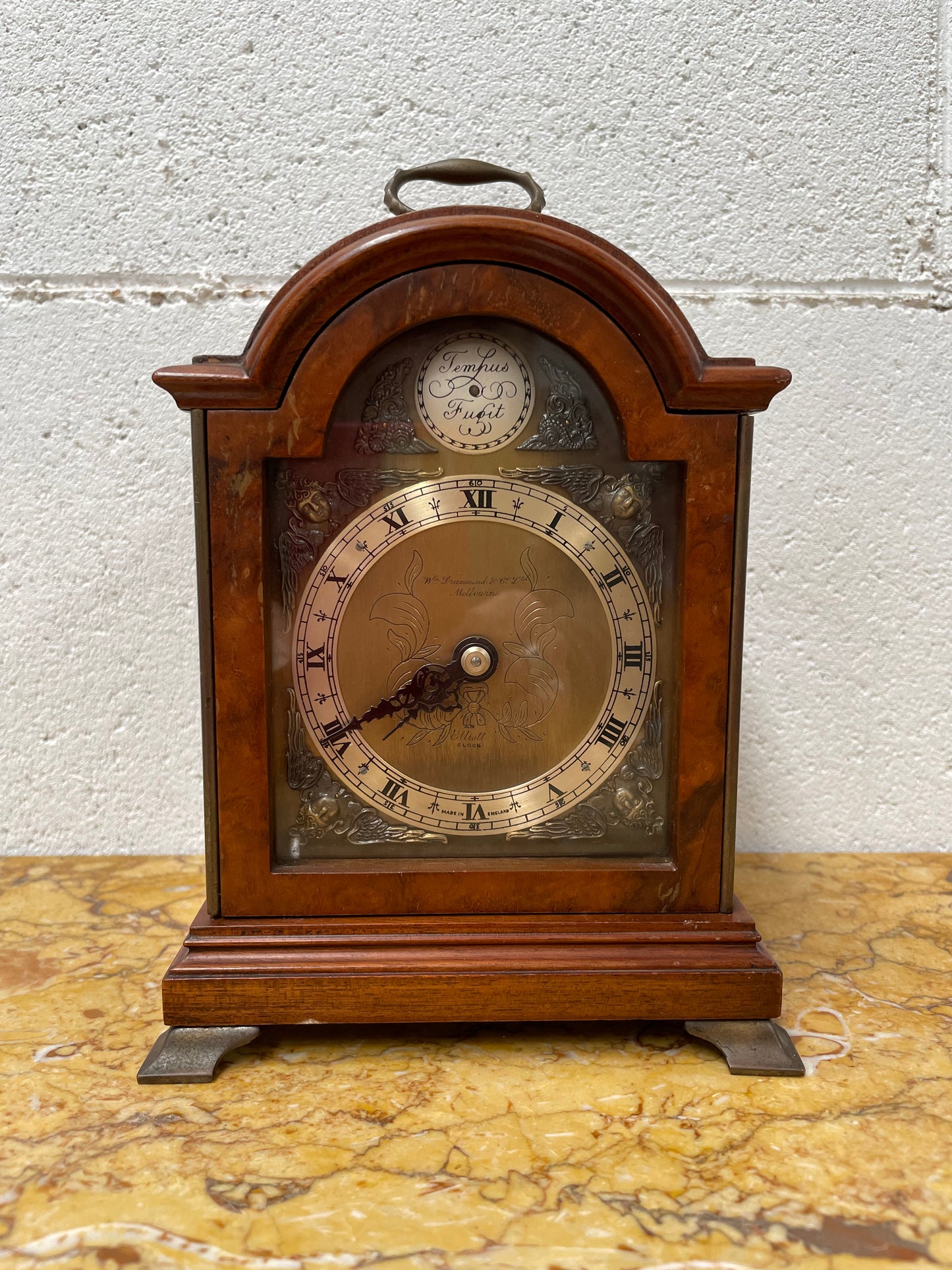 Gorgeous miniature Mahogany Elliott of London&nbsp;mantle timepiece retailed by Drummond and Co Melbourne. It is in good working order and in good original detailed condition.