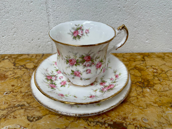 Stoke on Trent Paragon Bone China "Victorian Rose" trio set, cup, saucer and tea plate. In good original condition and made in England with stamp on base.