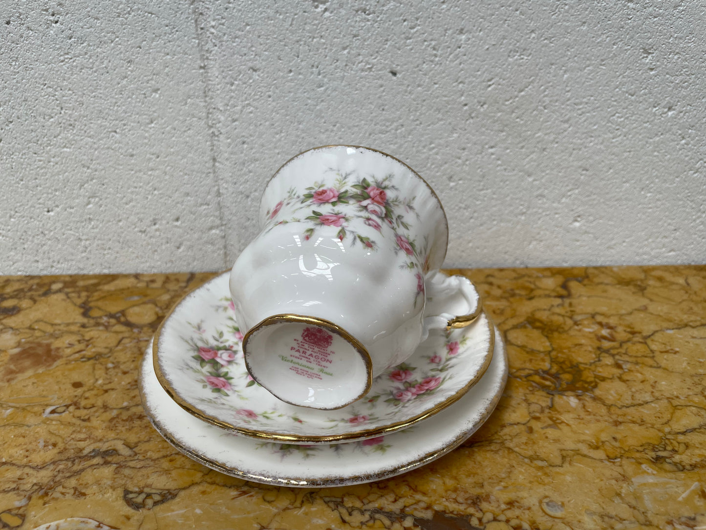 Stoke on Trent Paragon Bone China "Victorian Rose" trio set, cup, saucer and tea plate. In good original condition and made in England with stamp on base.