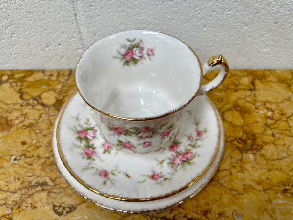 Stoke on Trent Paragon Bone China "Victorian Rose" trio set, cup, saucer and tea plate. In good original condition and made in England with stamp on base.