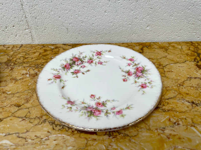 Stoke on Trent Paragon Bone China "Victorian Rose" trio set, cup, saucer and tea plate. In good original condition and made in England with stamp on base.