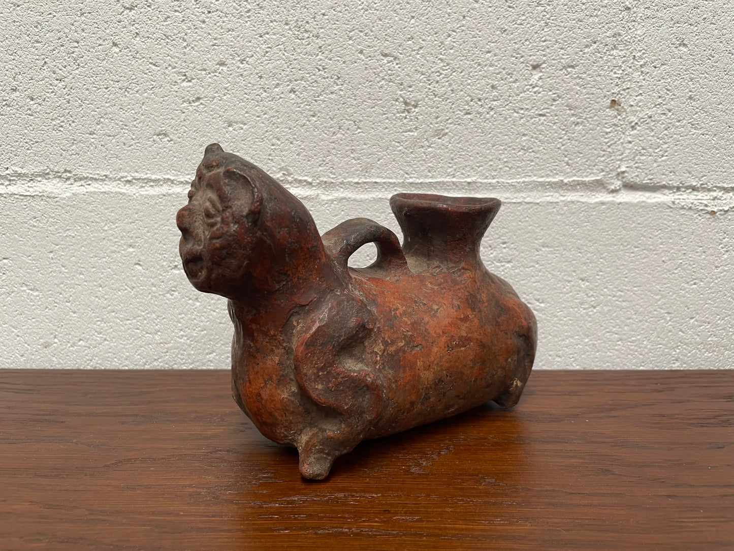 Pre-Columbia terracotta ceramic vessel. Most likely depicting a cat in good condition for its age. 