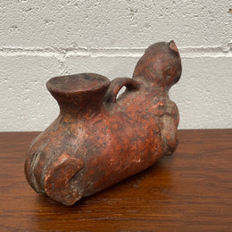 Pre-Columbia terracotta ceramic vessel. Most likely depicting a cat in good condition for its age. 