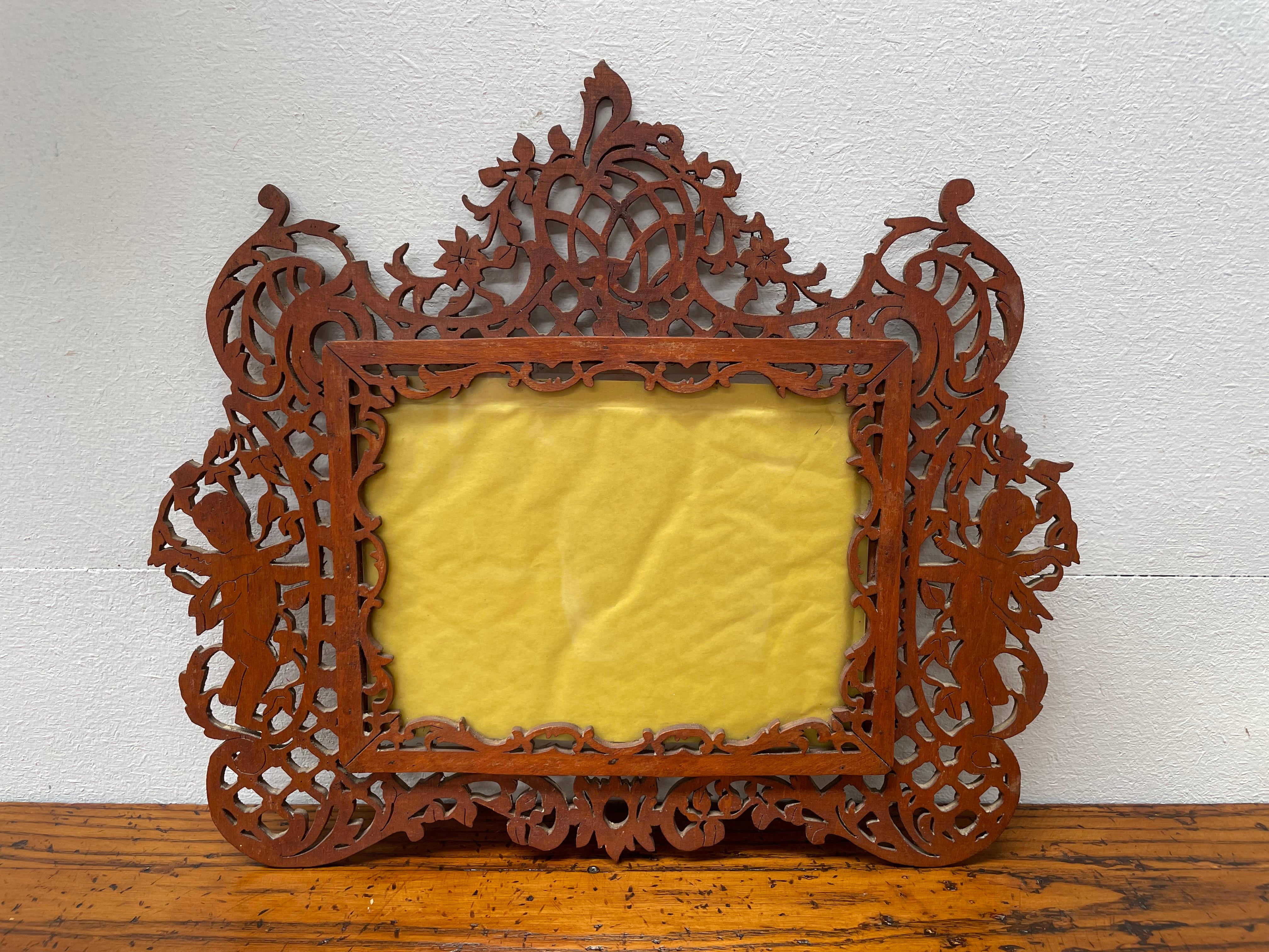 Antique Wooden Fretwork Picture Frame Featuring Cherubs
