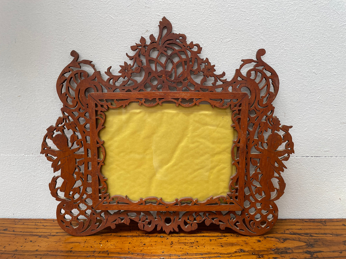 Antique Wooden Fretwork Picture Frame Featuring Cherubs