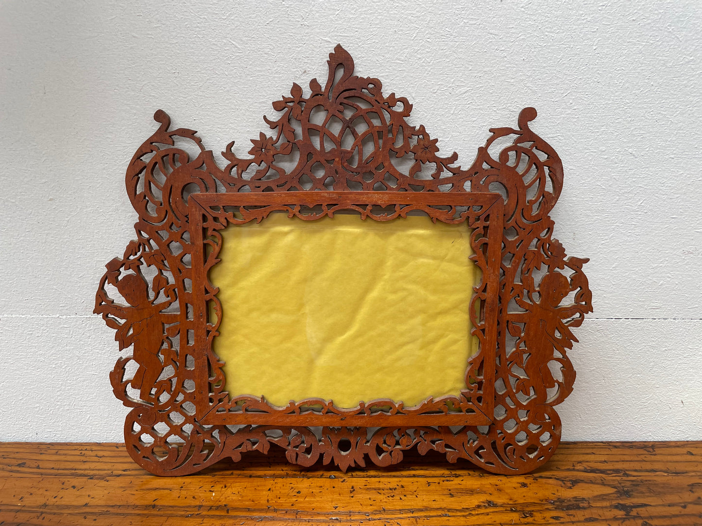 Antique Wooden Fretwork Picture Frame Featuring Cherubs