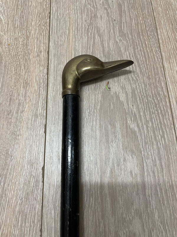 Vintage Victorian style walking stick with brass duck head. In good original condition