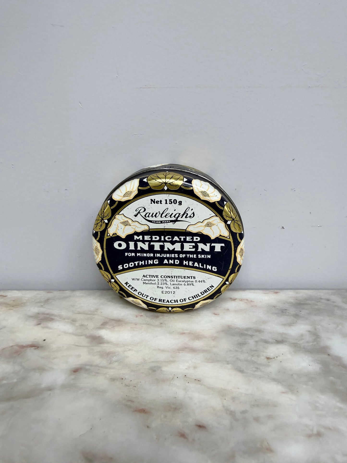 Vintage Rawleigh's Ointment Tin