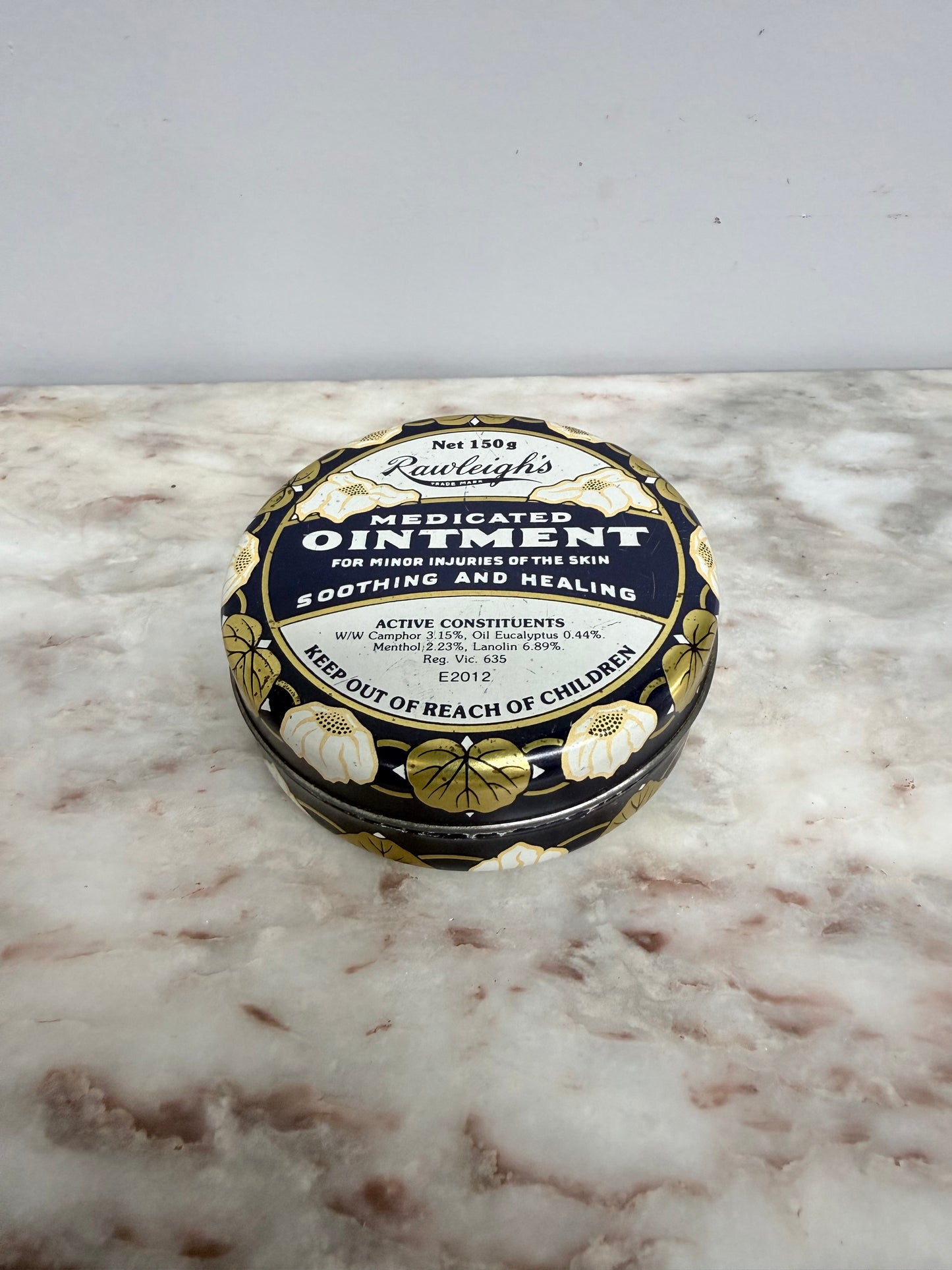 Vintage Rawleigh's Ointment Tin