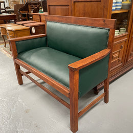 Rustic Arts and Crafts upholstered green bench seat. Made of English oak and very comfortable to sit on. In good original condition. Please see all photos as they form part of the description and condition.