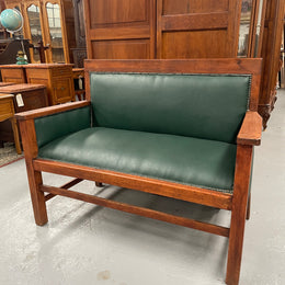 Rustic Arts and Crafts upholstered green bench seat. Made of English oak and very comfortable to sit on. In good original condition. Please see all photos as they form part of the description and condition.