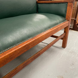 Rustic Arts and Crafts upholstered green bench seat. Made of English oak and very comfortable to sit on. In good original condition. Please see all photos as they form part of the description and condition.