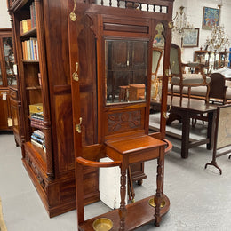 Lovely Edwardian walnut stand with six brass hooks and a storage box with lift up lid . Very nice carving to back and in good original condition. Please view photos as they help to form part of the description and condition.&nbsp;