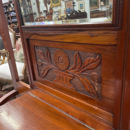 Lovely Edwardian walnut stand with six brass hooks and a storage box with lift up lid . Very nice carving to back and in good original condition. Please view photos as they help to form part of the description and condition.