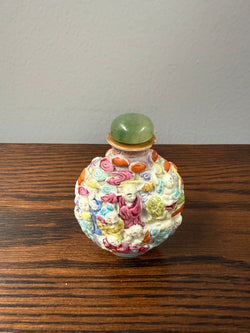 Late Qing Dynasty Famille Rose Moulded Porcelain Snuff Bottle