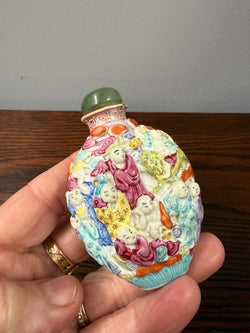 Late Qing Dynasty Famille Rose Moulded Porcelain Snuff Bottle