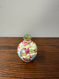Late Qing Dynasty Famille Rose Moulded Porcelain Snuff Bottle
