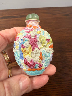 Late Qing Dynasty Famille Rose Moulded Porcelain Snuff Bottle