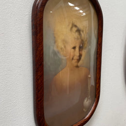 Vintage framed oval picture frame with concave glass front and ready to hang. Sourced locally and in good original condition. Please see all photos as they form part of the description and condition.