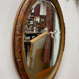 Lovely decorative vintage mirror with a pretty oval frame and bevelled edge mirror. Sourced locally and in good original condition. Please see photos as they form part of the description and condition.