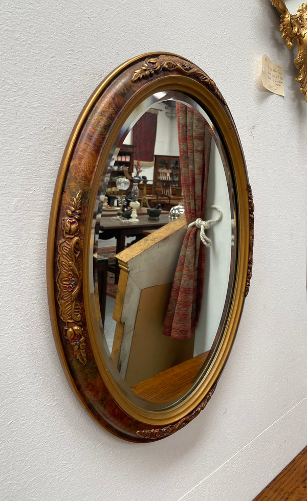 Lovely decorative vintage mirror with a pretty oval frame and bevelled edge mirror. Sourced locally and in good original condition. Please see photos as they form part of the description and condition.