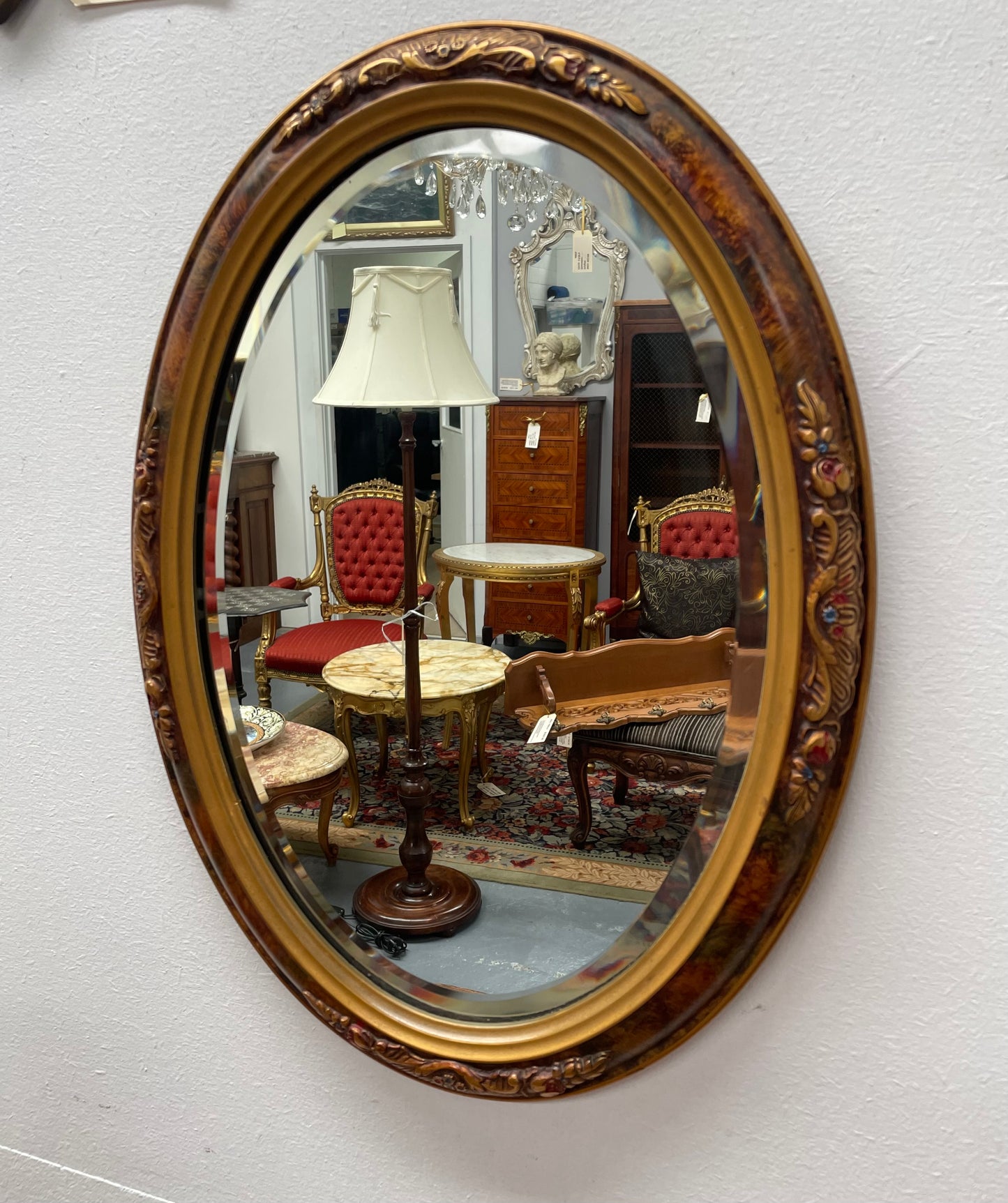 Lovely decorative vintage mirror with a pretty oval frame and bevelled edge mirror. Sourced locally and in good original condition. Please see photos as they form part of the description and condition.