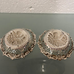 Lovely pair of sterling silver and silver gilt Edwardian bon bon dishes with decorative cherubs and in good original condition. Please see photos as they form part of the description.