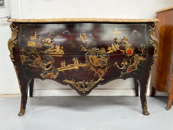 A stunning Antique Louis XV style Chinoiseries marble top two drawer commode with beautiful hand painted decorative details throughout. It has quality decorative ormolu mounts and handles. It is in good original detailed condition. 