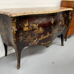 A stunning Antique Louis XV style Chinoiseries marble top two drawer commode with beautiful hand painted decorative details throughout. It has quality decorative ormolu mounts and handles. It is in good original detailed condition. 