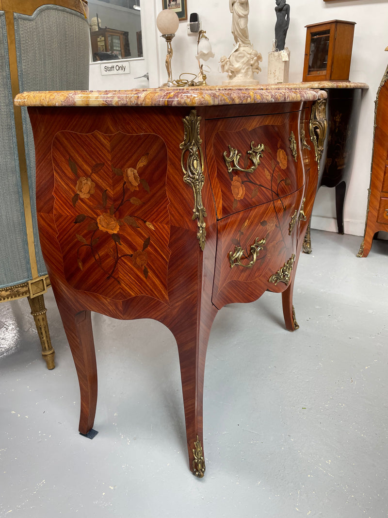 Beautiful French Louis XV style marquetry inlaid two drawer commode. It is of pleasing small proportions and a lovely coloured marble top. It is in good original detailed condition. Please see all photos as they form part of the description and condition.