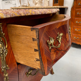 Beautiful French Louis XV style marquetry inlaid two drawer commode. It is of pleasing small proportions and a lovely coloured marble top. It is in good original detailed condition. Please see all photos as they form part of the description and condition.