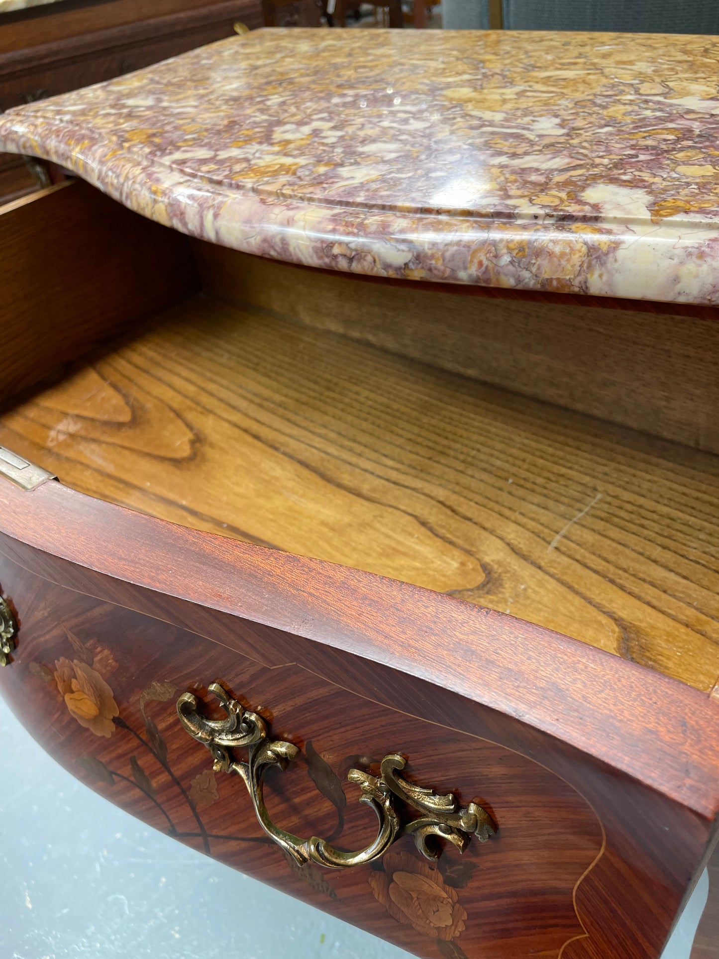 Beautiful French Louis XV style marquetry inlaid two drawer commode. It is of pleasing small proportions and a lovely coloured marble top. It is in good original detailed condition. Please see all photos as they form part of the description and condition.