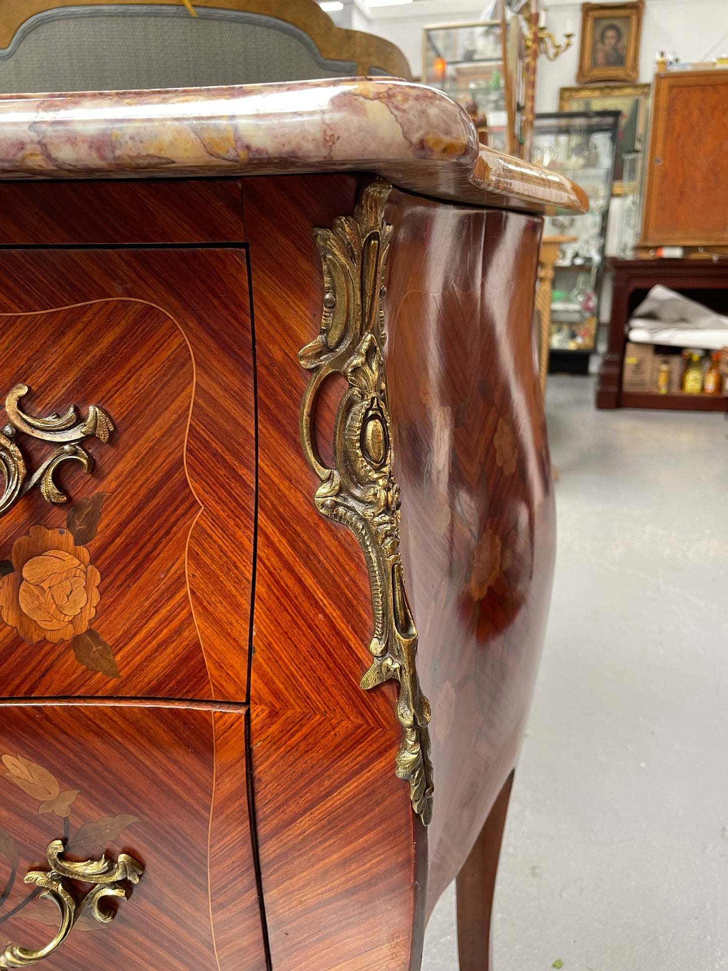 Beautiful French Louis XV style marquetry inlaid two drawer commode. It is of pleasing small proportions and a lovely coloured marble top. It is in good original detailed condition. Please see all photos as they form part of the description and condition.