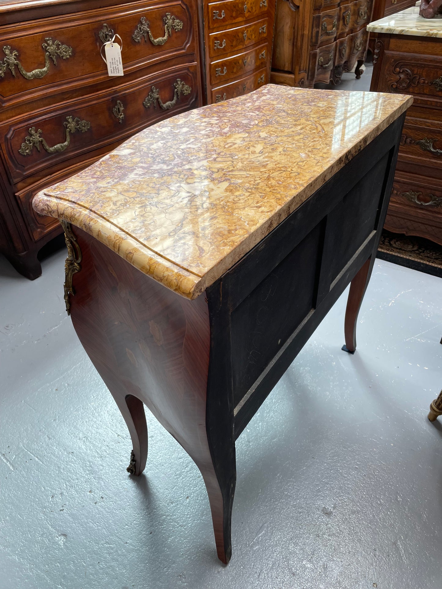 Beautiful French Louis XV style marquetry inlaid two drawer commode. It is of pleasing small proportions and a lovely coloured marble top. It is in good original detailed condition. Please see all photos as they form part of the description and condition.