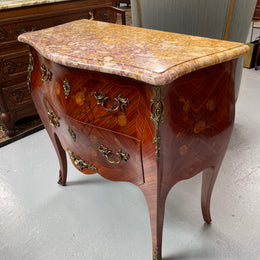 Beautiful French Louis XV style marquetry inlaid two drawer commode. It is of pleasing small proportions and a lovely coloured marble top. It is in good original detailed condition. Please see all photos as they form part of the description and condition.