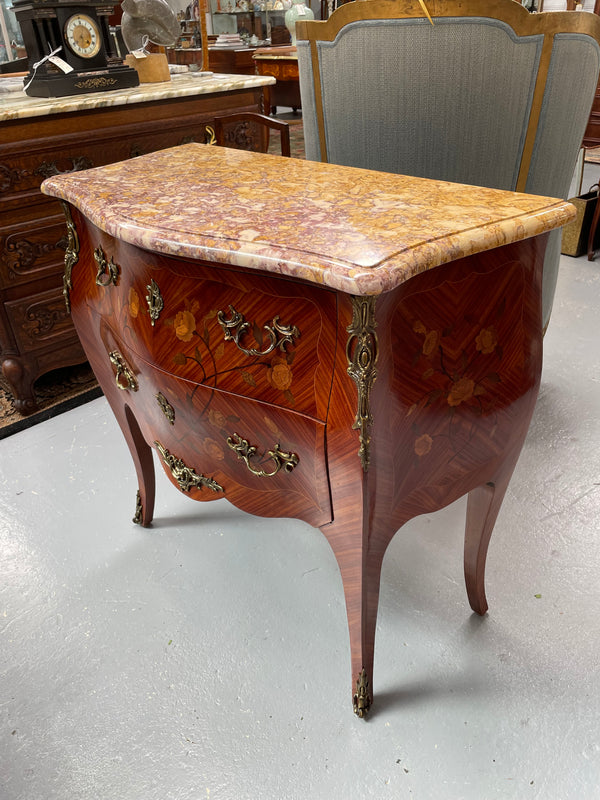 Beautiful French Louis XV style marquetry inlaid two drawer commode. It is of pleasing small proportions and a lovely coloured marble top. It is in good original detailed condition. Please see all photos as they form part of the description and condition.