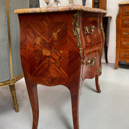 Beautiful French Louis XV style marquetry inlaid two drawer commode. It is of pleasing small proportions and a lovely coloured marble top. It is in good original detailed condition. Please see all photos as they form part of the description and condition.