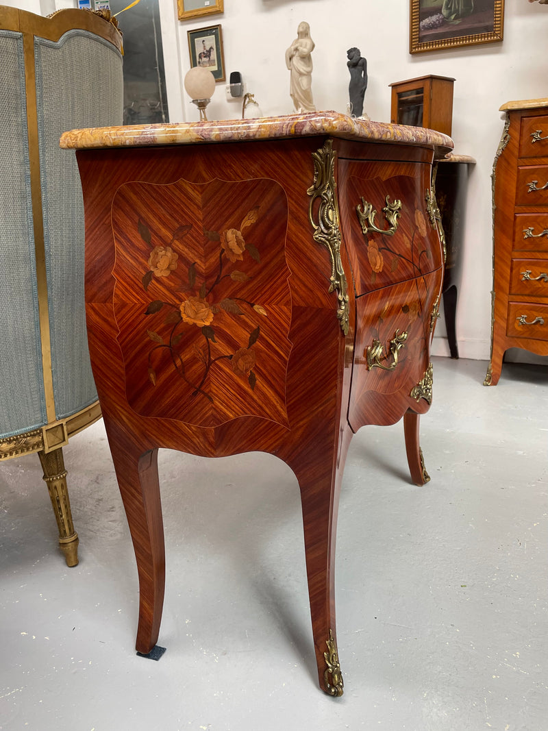 Beautiful French Louis XV style marquetry inlaid two drawer commode. It is of pleasing small proportions and a lovely coloured marble top. It is in good original detailed condition. Please see all photos as they form part of the description and condition.