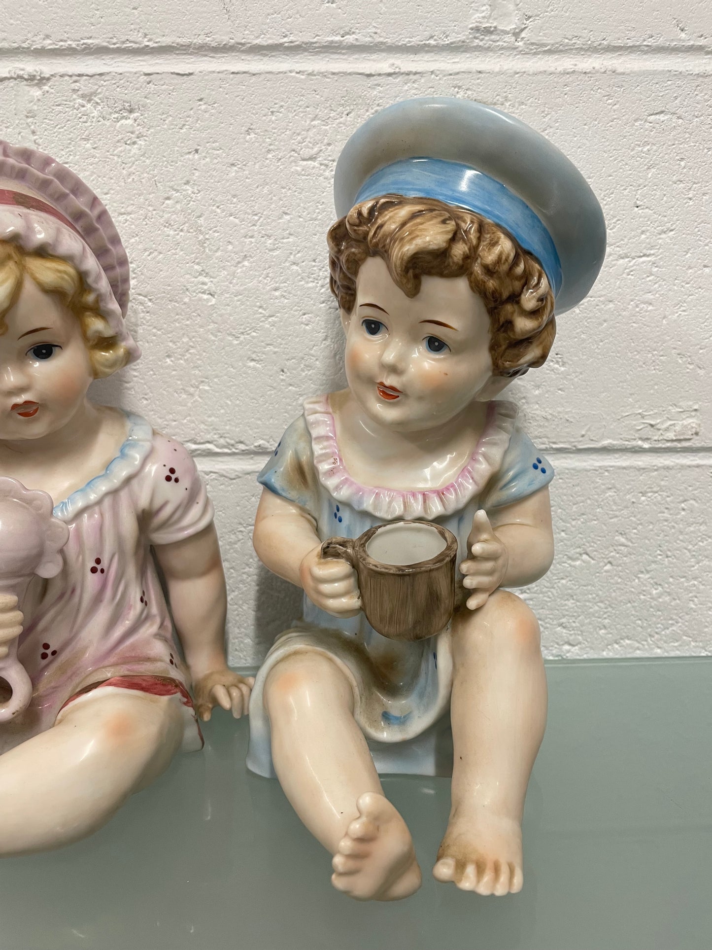 Pair of Vintage Piano Doll Figures