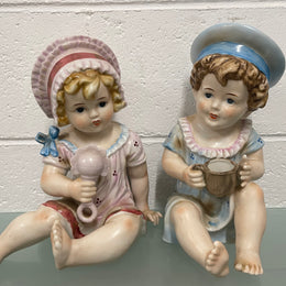 Pair of Vintage Piano Doll Figures