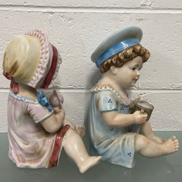 Pair of Vintage Piano Doll Figures