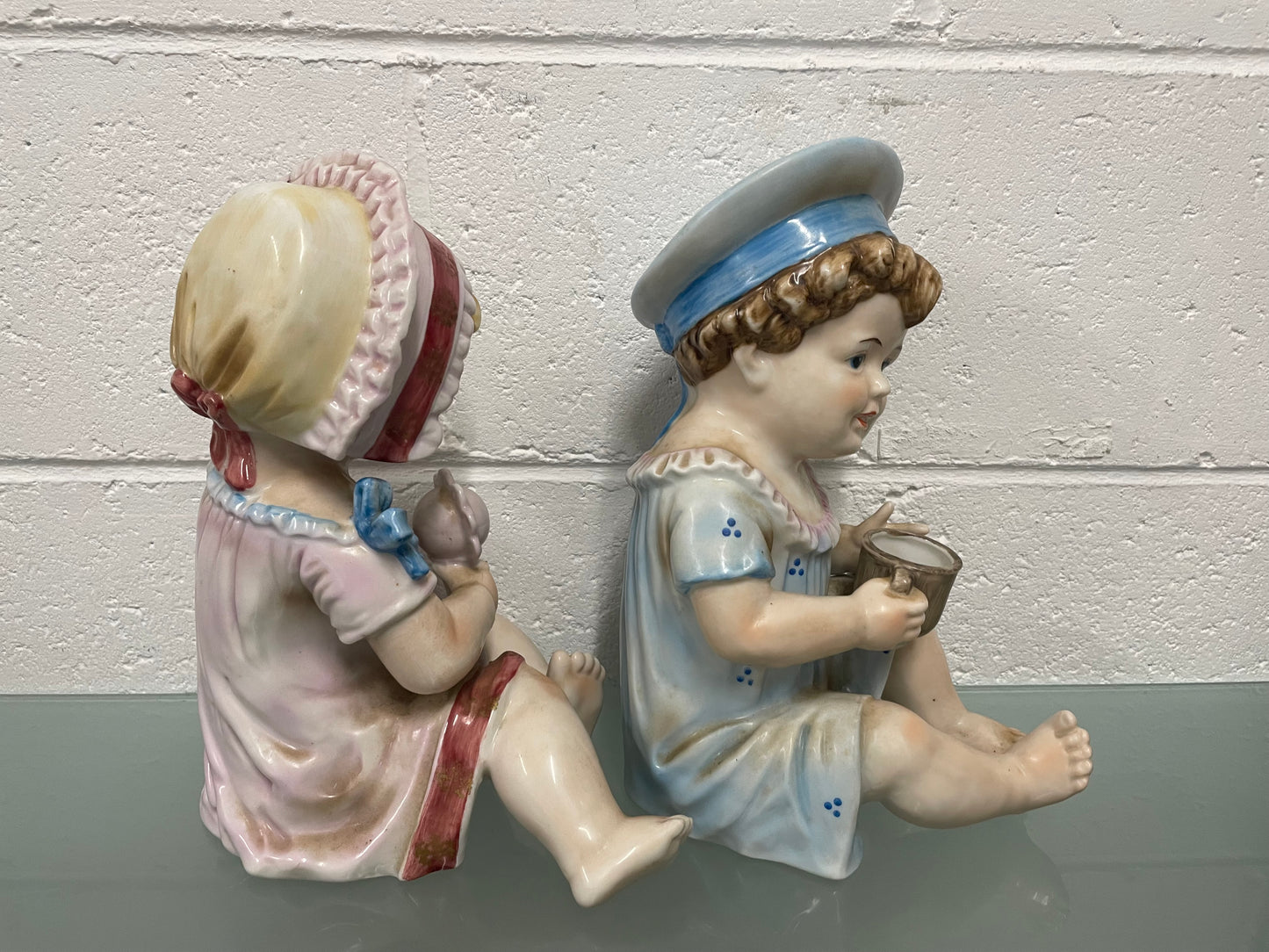 Pair of Vintage Piano Doll Figures