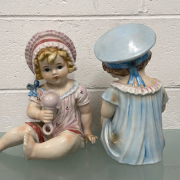 Pair of Vintage Piano Doll Figures