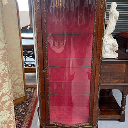 Beautiful French Louis XV style Walnut and bronze mounted vitrine with fabric interior and glass shelves. Sourced from France and in good original detailed condition.