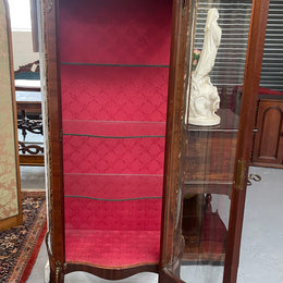 Beautiful French Louis XV style Walnut and bronze mounted vitrine with fabric interior and glass shelves. Sourced from France and in good original detailed condition.