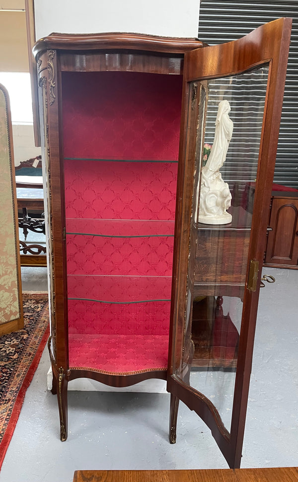 Beautiful French Louis XV style Walnut and bronze mounted vitrine with fabric interior and glass shelves. Sourced from France and in good original detailed condition.