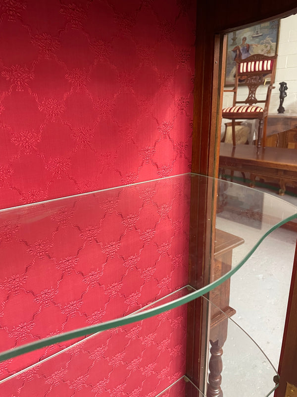 Beautiful French Louis XV style Walnut and bronze mounted vitrine with fabric interior and glass shelves. Sourced from France and in good original detailed condition.