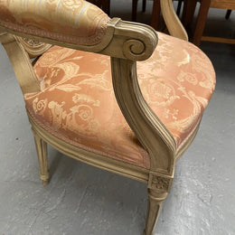 French Louis XV style cane back and upholstered seat fauteuil. With original paint and fabric is in original used condition with some stains and tears. Overall they are in good original used condition. Circa 1950's.