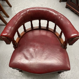 Fabulous late Victorian burgundy leather desk/tub chair on castor wheels. It is very comfortable to sit in and in good original  condition.