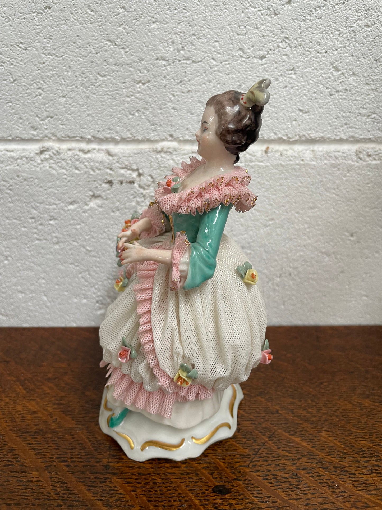 Dresden Figurine of Lady Holding Basket of Flowers